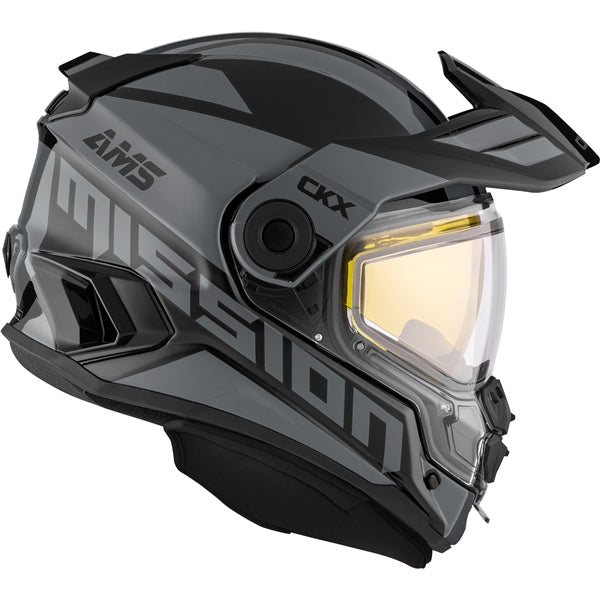 A full face CKX Mission AMS helmet in black color with a clear visor and a retractable sun visor, designed for winter trail riding.